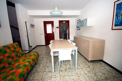 Terraced house with communal pool