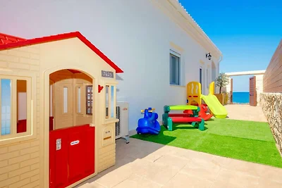 Villa aan het strand met privézwembad