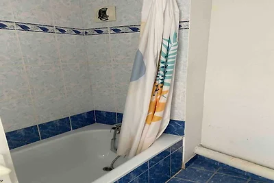 Appartement aan het strand met zwembad