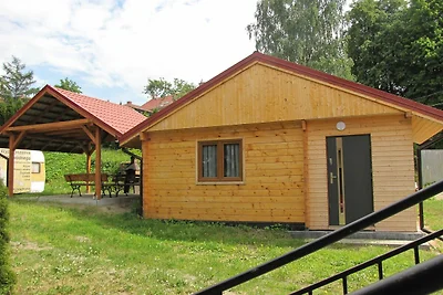 Ferienhaus aus Holz in der Nähe des Sees