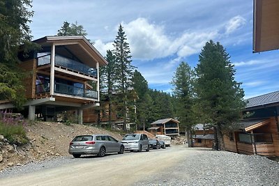 Chalet superior con sauna y jacuzzi.
