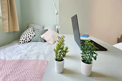 Camera accogliente in un accogliente appartam...