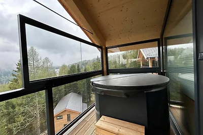 Chalet mit Sauna auf dem Balkon
