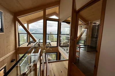 Chalet mit Sauna auf dem Balkon