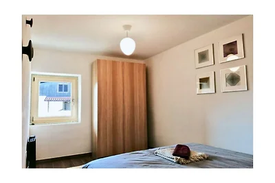 PLAVICA with cozy terrace 1000m from the bath...