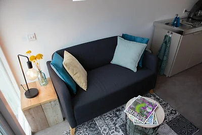 Leuke Tiny Home gelegen naast een eigen