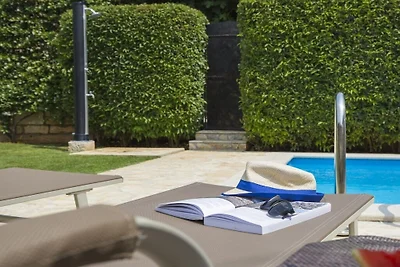 Ferienhaus in Tinjan mit Schwimmbecken