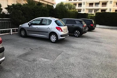 Designstudio mit Terrasse und Strand