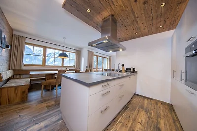 Luxe chalet met vier badkamers, bij een...