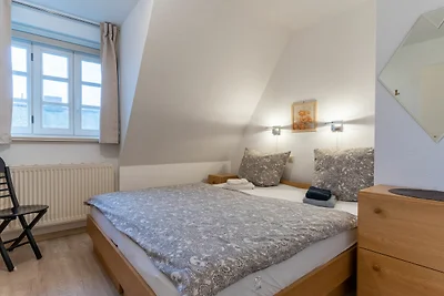 Apartment mit Kamin in einer reetgedeckten...