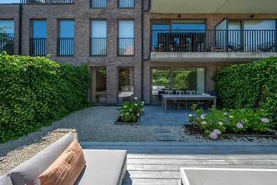 Gelijkvloers appartement met tuin