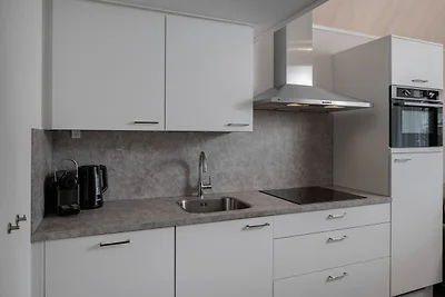 Modernes Tiny House mit Spülmaschine, Strand ...