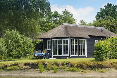 Reetgedeckte Lodge, Klimaanlage & Geschirrspü...