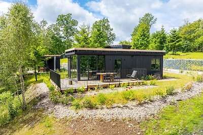 Schöne Lodge mit Sauna in einem Naturresort