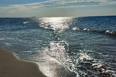 Begane grond appartement aan het strand