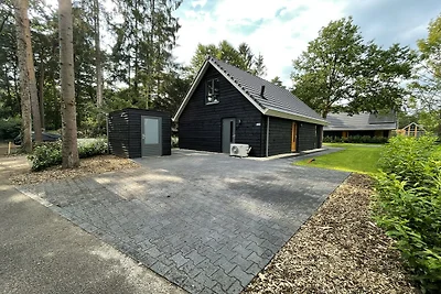 Ferienhaus in einem bewaldeten Gebiet in...