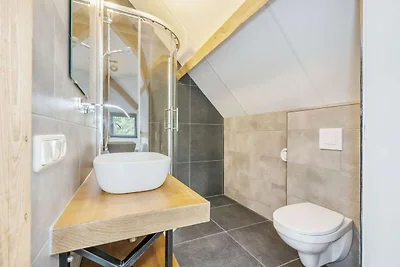 Soggiorno in lodge moderno con vista sullo...