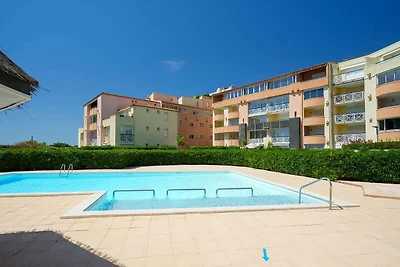 Familieappartement aan het strand in Cap...