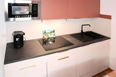 Appartamento con piscina e jacuzzi nelle Alpi