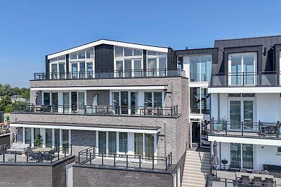 Luxe appartement met uitzicht op het water