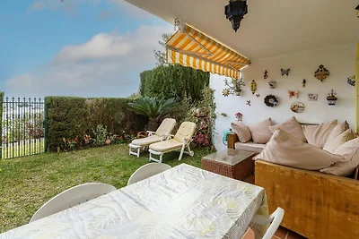 Appartement met tuin en gemeenschappelijk...