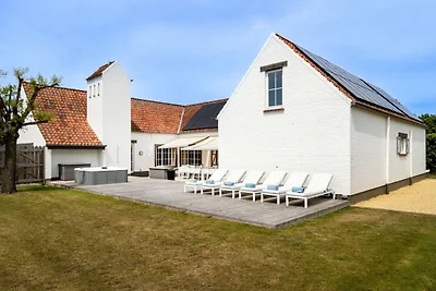 Kustvilla met spa en tuin
