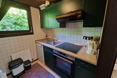 Freistehender Holz-Bungalow mit Terrasse in e...