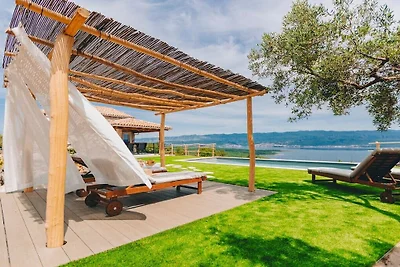 Ferienhaus in Risika mit Schwimmbecken