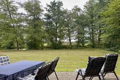Baita in legno con vista sul pascolo, Eschede