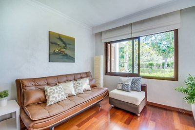 Appartement met privétuin