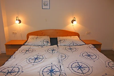 Appartement in Orth bij haven en vuurtoren