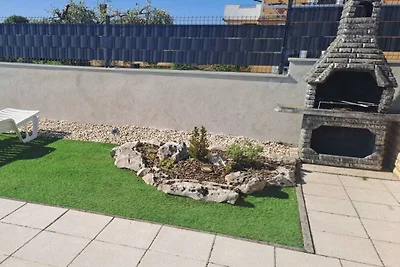 Casa de vacaciones en Buje con piscina.
