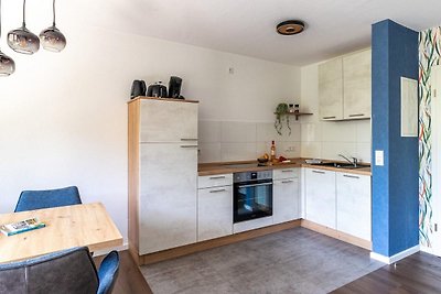 Appartement met balkon bij golfbaan in...