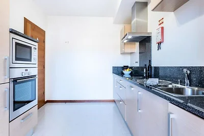 Wohnung in Luz mit Meerblick & Pools