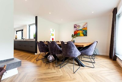 Ferienhaus mit Sauna und zwei Hottubs in eine...