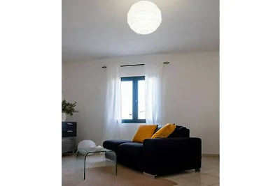 Ferienhaus in Telti mit Terrasse