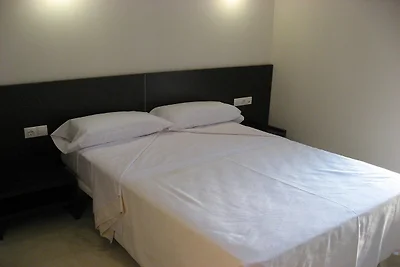 Appartement met uitzicht op het zwembad L'...