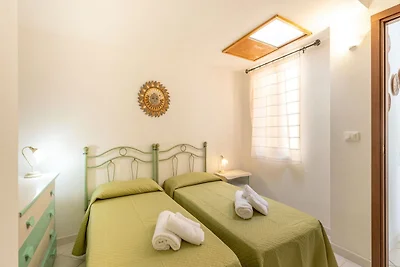 Wohnung in Calagonone mit Garten