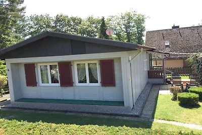 Houten vakantiehuis met wintertuin