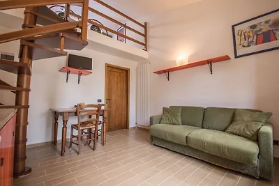 Cottage rustico a Magione con piscina