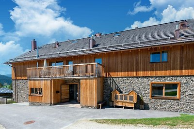 Chalet in Wölting met natuurlijke zwemvijver