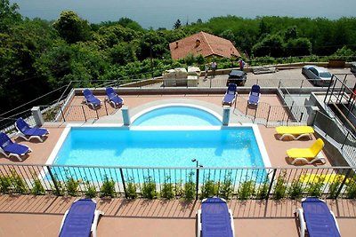 Lakeview apartment in Oggebbio with swimming...