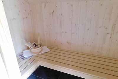 Invitante chalet con sauna