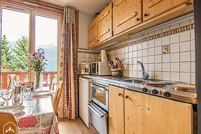 Kleine Chalet-Atmosphäre mit Bergblick.