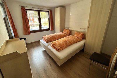 Chalet met 2 appartementen omgeven door...