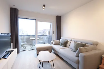 Modern appartement vlakbij zee en strand