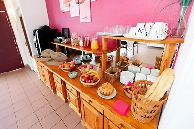 Appartement in Cassen met zwembad en spa