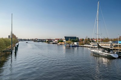 Huisje met ruime tuin in watersport gebied