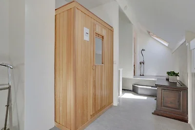 Casa di design con camino a Bedafse Bergen