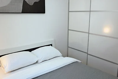 Ampio appartamento con terrazza coperta
